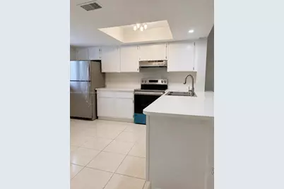 106 Palm Beach Trace Dr #106, Royal Palm Beach, FL 33411 - Photo 3