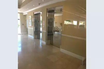 201 Golden Isles Dr #409, Hallandale Beach, FL 33009 - Photo 11
