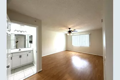 5045 Wiles Rd #201, Coconut Creek, FL 33073 - Photo 5