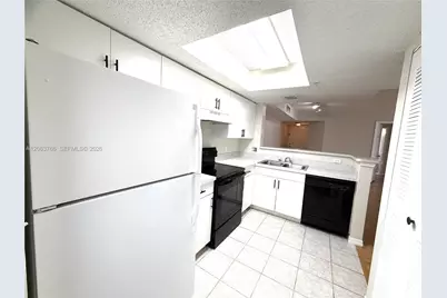 5045 Wiles Rd #201, Coconut Creek, FL 33073 - Photo 9
