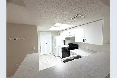 5045 Wiles Rd #201, Coconut Creek, FL 33073 - Photo 11
