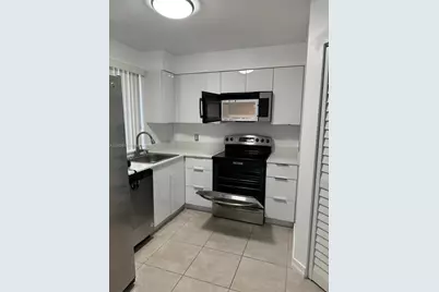 6135 NW 186th St #312, Hialeah, FL 33015 - Photo 3