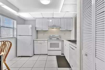 8852 W McNab Rd #203, Tamarac, FL 33321 - Photo 13