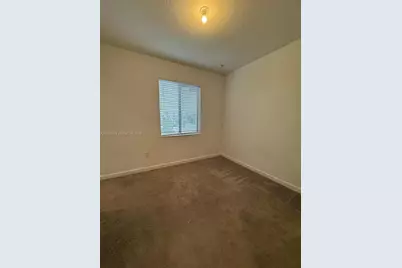 768 NE 206th Ter #768, Miami, FL 33179 - Photo 15