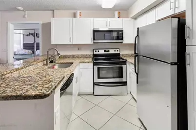 831 Lyons Rd #23101, Coconut Creek, FL 33063 - Photo 11