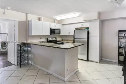 831 Lyons Rd #23101, Coconut Creek, FL 33063 - Photo 9