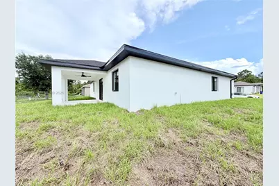 705 Colyer St E, Lehigh Acres, FL 33974 - Photo 59