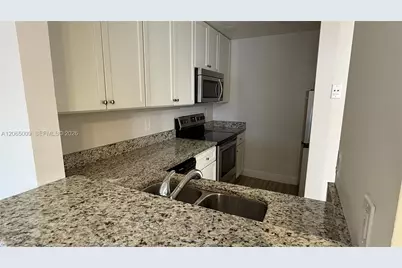 1006 Twin Lakes Dr #20-E, Coral Springs, FL 33071 - Photo 11