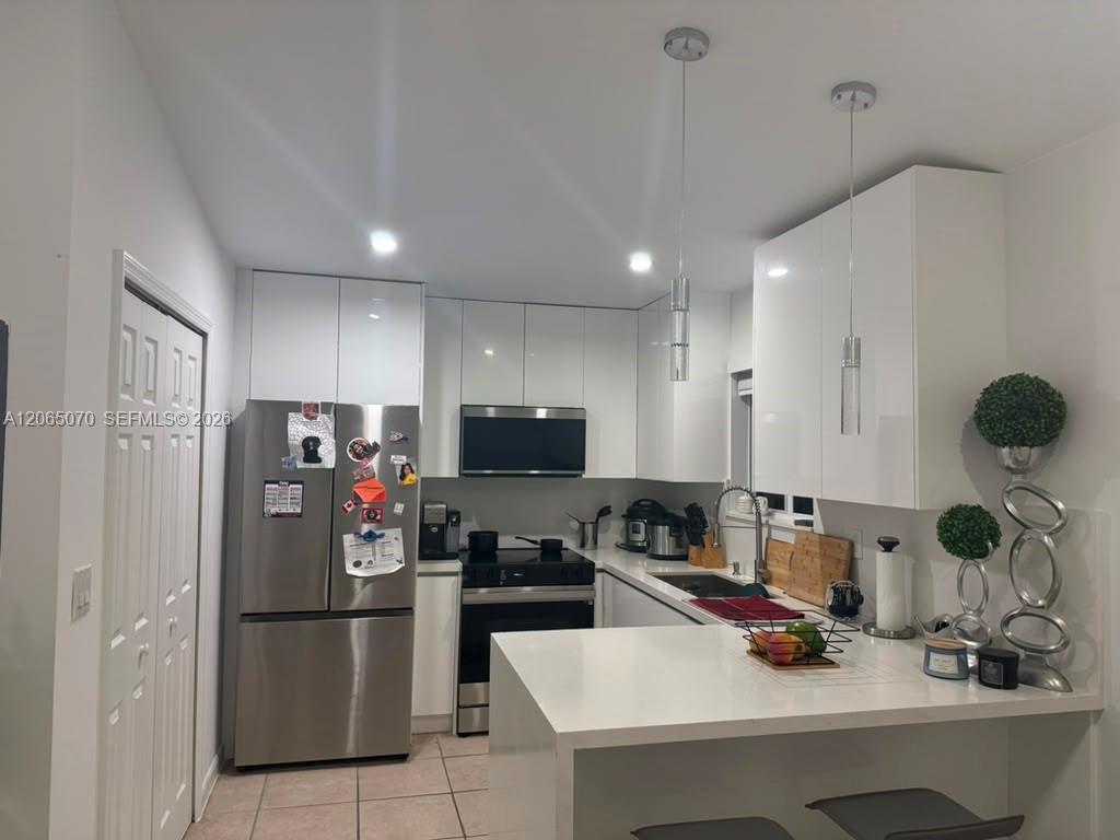 945 NE 33rd Terrace #201 - 945 NE 33rd Terrace #201, Homestead, FL 33033 Luxury Property | Jose Angel Pina
