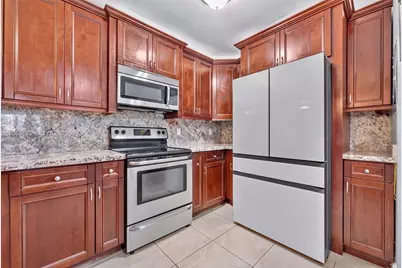 3007 N Oakland Forest Dr #107, Oakland Park, FL 33309 - Photo 1