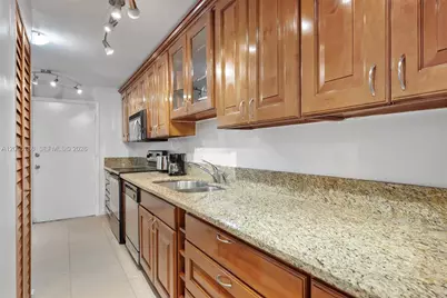3660 NE 166th St #307, North Miami Beach, FL 33160 - Photo 9