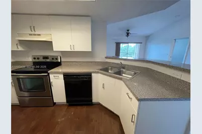 5025 Wiles Rd #303, Coconut Creek, FL 33073 - Photo 3