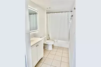 8010 N Nob Hill Rd #102, Tamarac, FL 33321 - Photo 13