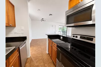 28 Crossings Cir #E, Boynton Beach, FL 33435 - Photo 3