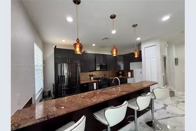 2851 W Prospect Rd #704, Tamarac, FL 33309 - Photo 17