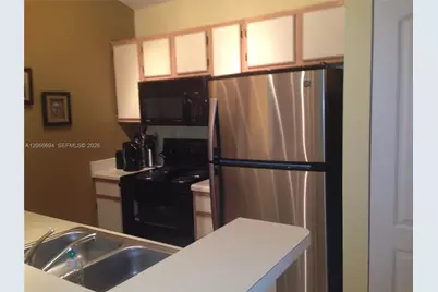2880 N Oakland Forest Dr #313, Oakland Park, FL 33309 - Photo 9