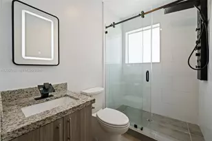 165 NW 39th St, Miami, FL 33127 - Photo 13