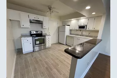 2061 NW 47th Ter #306, Lauderhill, FL 33313 - Photo 1