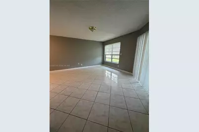 3100 Riverside Dr #104, Coral Springs, FL 33065 - Photo 1