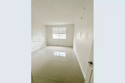 8030 N Nob Hill Rd #105, Tamarac, FL 33321 - Photo 9