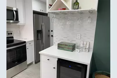 100 Golden Isles Dr #409, Hallandale Beach, FL 33009 - Photo 17