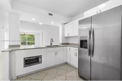 3660 NE 166th St #114, North Miami Beach, FL 33160 - Photo 7
