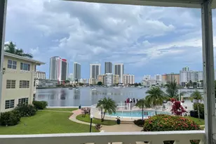 450 Golden Isles Dr, Hallandale Beach, FL 33009 - Photo 1