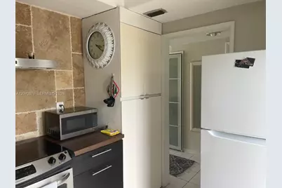 450 Golden Isles Dr #2F, Hallandale Beach, FL 33009 - Photo 13