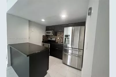 4301 NW South Tamiami Canal Dr #3-314, Miami, FL 33126 - Photo 5