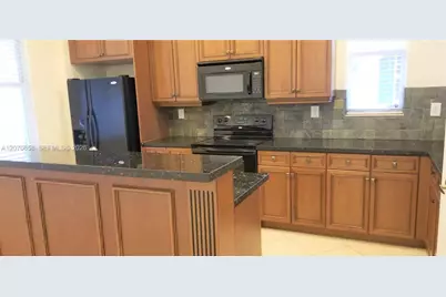 6033 NW 118th Dr #6033, Coral Springs, FL 33076 - Photo 5
