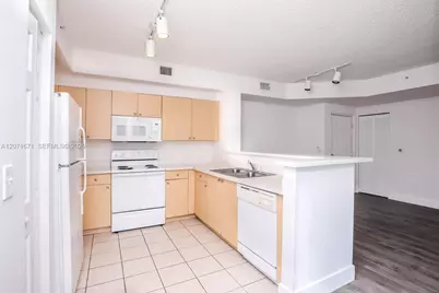 8050 N Nob Hill Rd #106, Tamarac, FL 33321 - Photo 5