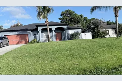 1654 SE Holiday Rd, Port Saint Lucie, FL 34952 - Photo 1