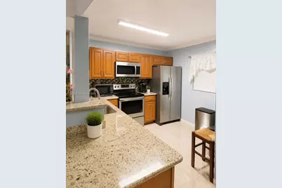 3955 N Nob Hill Rd #403, Sunrise, FL 33351 - Photo 9