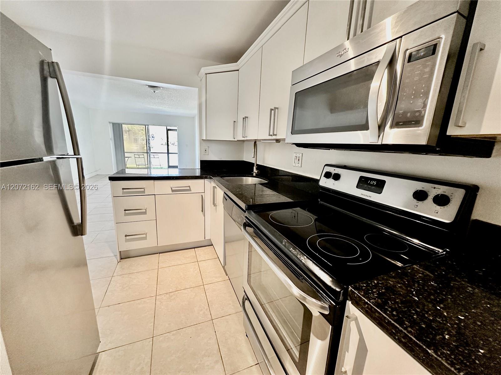 7901 S Colony Cir S #104 - 7901 S Colony Cir S #104, Tamarac, FL 33321 Luxury Property | Jose Angel Pina