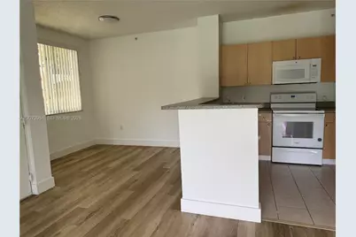 8010 N Nob Hill Rd #108, Tamarac, FL 33321 - Photo 3