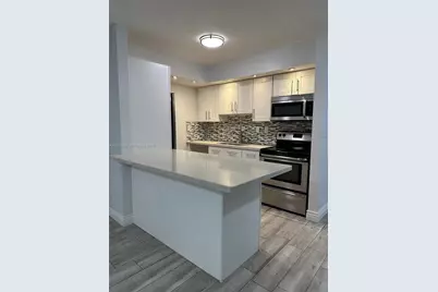 18875 NW 62nd Ave #106, Hialeah, FL 33015 - Photo 1