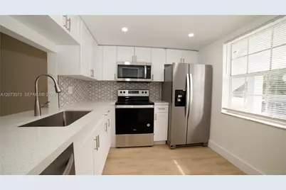 4291 NW 9th Ave #101, Deerfield Beach, FL 33064 - Photo 1