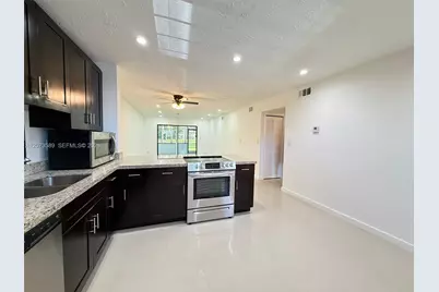 6095 N Sabal Palm Blvd #103, Tamarac, FL 33319 - Photo 1