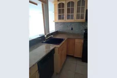 401 Golden Isles Dr #211, Hallandale Beach, FL 33009 - Photo 5