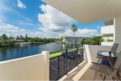 401 Golden Isles Dr #211, Hallandale Beach, FL 33009 - Photo 1