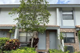 9849 S Riverside Dr, Coral Springs, FL 33071 - Photo 1