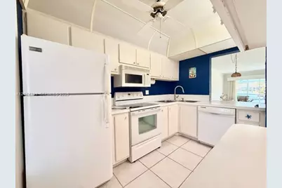 455 Paradise Isle Blvd #109, Hallandale Beach, FL 33009 - Photo 11