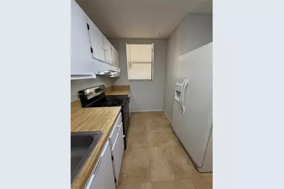 8429 Forest Hills Dr #202, Coral Springs, FL 33065 - Photo 1