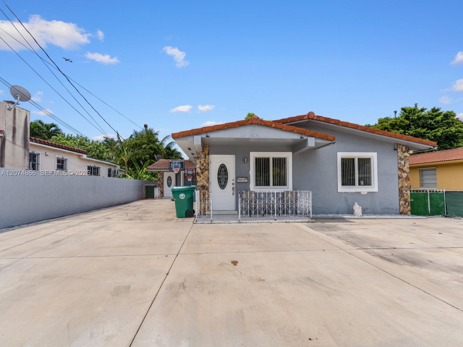 740 NW 32nd Ct - 740 NW 32nd Ct, Miami, FL 33125 Luxury Property | Jose Angel Pina