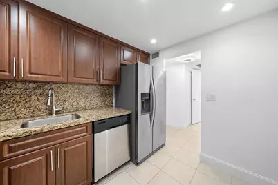 401 Golden Isles Dr #406, Hallandale Beach, FL 33009 - Photo 7