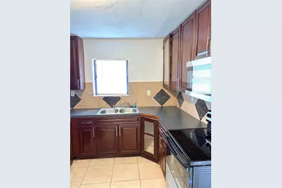 1927 NW 64th St, Miami, FL 33147 - Photo 7
