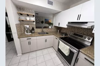 1195 NW 125th Ct #101, Miami, FL 33182 - Photo 3