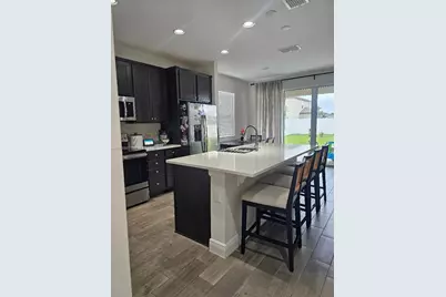 5605 Blowing Wind Pl, Saint Cloud, FL 34771 - Photo 5