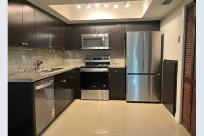 40 Madrid Ln #1-11, Davie, FL 33324 - Photo 13