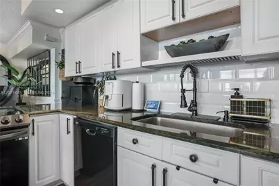 2150 Sans Souci Blvd #E1, North Miami, FL 33181 - Photo 37